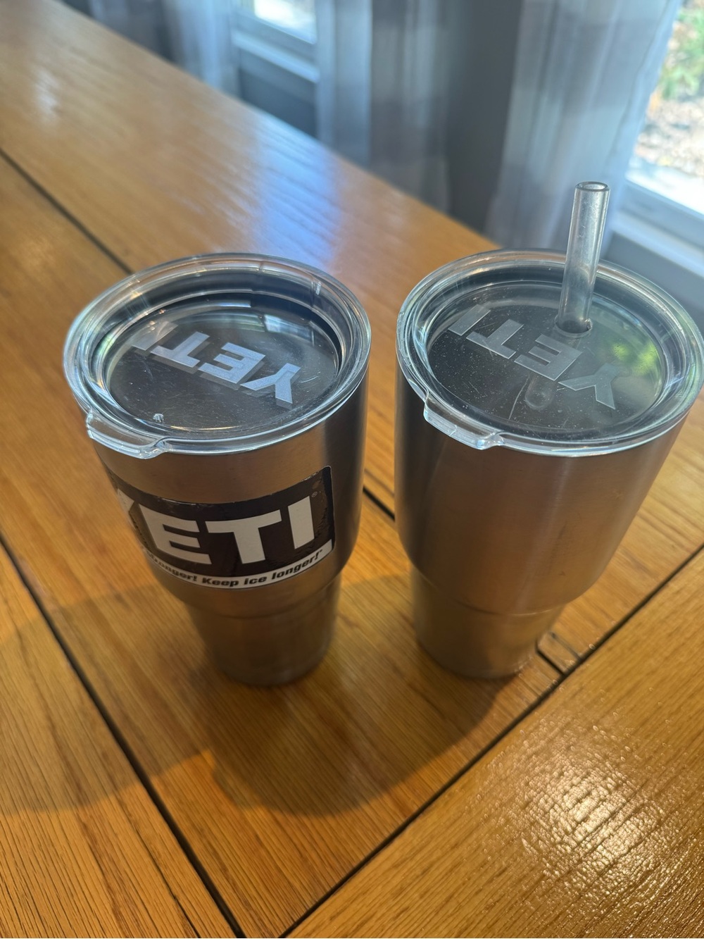 Set of 2 Yeti stainless 32oz tumblers one with lid and straw one with sip lid. - Picture 3 of 4